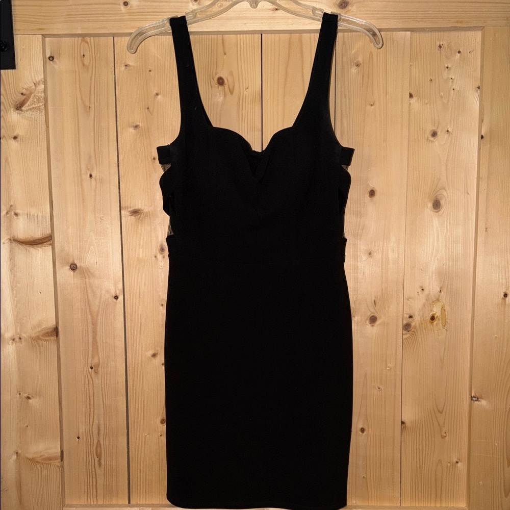 B. Smart Black Dress with mesh side accents Size 9/10 Retails $49